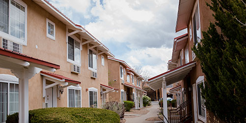 A pathway between units of affordable housing.